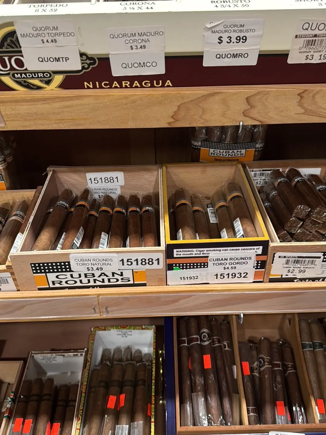 Budget cigar selection with Quorum Maduro and Cuban Rounds at GS Spirits Eastlake Ohio