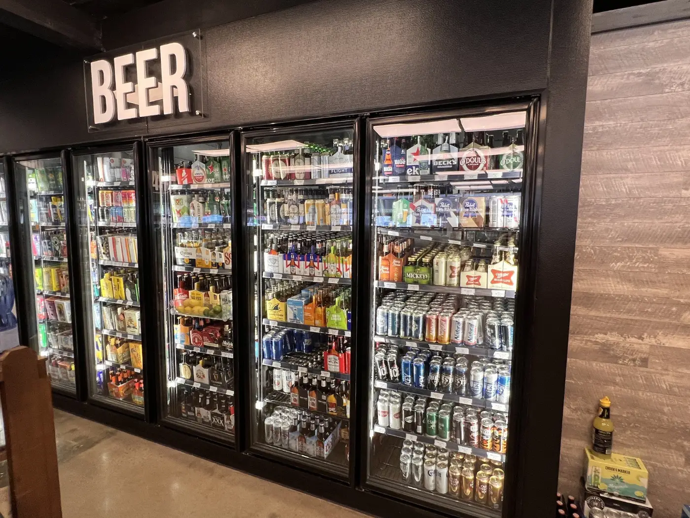 Cold beer cooler wall at GS Spirits liquor store in Eastlake Ohio